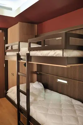 a bunk bed room with three bunk beds in it at Résidence Residéal Premium Cannes in Cannes