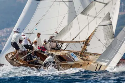 a group of people on a sailboat in the water at Hotel Le Mistral in Cannes