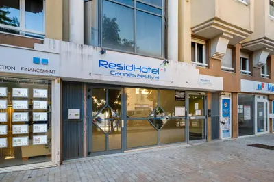a store front of a building with glass doors at Residhotel Cannes Festival in Cannes