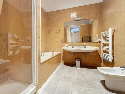 a bathroom with a sink and a shower and a toilet at 2 bedroom Forville. 8 mins from the Palais. 328 in Cannes