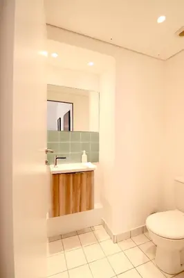 a bathroom with a toilet and a sink at Residence Buttura in Cannes