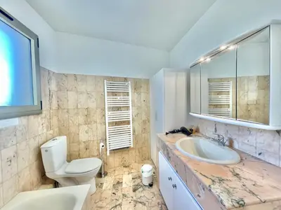 a bathroom with a sink and a toilet at Vezelay, by Welcome to Cannes in Cannes