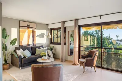 a living room with a couch and chairs at Vivre Cannes l Parking l Balcony l 15min to La Croisette in Cannes