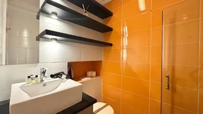 a bathroom with a sink and a toilet at Minerve by Welcome to Cannes in Cannes
