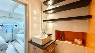 a bathroom with a sink and a shower at Minerve by Welcome to Cannes in Cannes