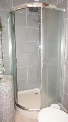 a shower stall in a bathroom with a toilet at Proche Croisette, Studio Cosy by Palmazur in Cannes