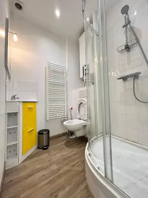 a bathroom with a shower and a sink and a toilet at Charming 2-bedroom apartment with quality amenities in Old Cannes in Cannes