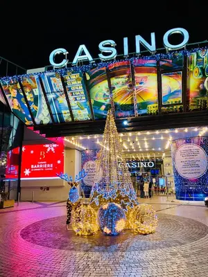 a lit up christmas tree in front of a casino at Cozy 2 bedroom apartment in the centre of Cannes near the CROISETTE in Cannes