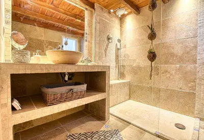 a bathroom with a sink and a shower at LE BOISE merveilleux duplex rustique, excellent emplacement à quelques pas du Palais in Cannes