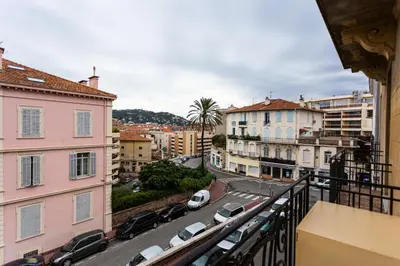 a view of a city street from a balcony at Relaxhome - Hypercentre - Clim - Netflix in Cannes