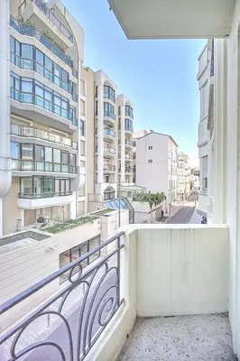 a balcony with a view of a building at Cannes Carré d'Or Cozy 1 BR balcony, Croisette Palais 2 mn by Olam Properties in Cannes
