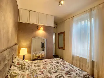 a bedroom with a bed and a window at FRGK 