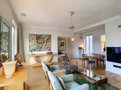 a living room with a couch and a table at FRGK 