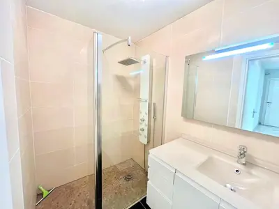 a bathroom with a shower and a sink at Branly 2, by Welcome to Cannes in Cannes