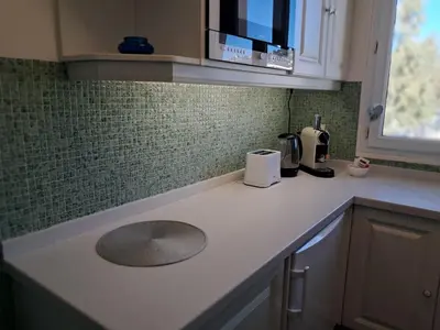 a kitchen counter top with a sink in a kitchen at LES MOUETTES A in Cannes