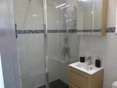 a bathroom with a shower and a sink at LE 31 in Cannes