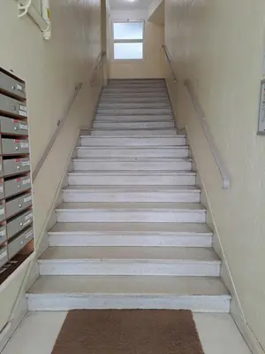 a staircase in an office building with a stair case at LE 31 in Cannes