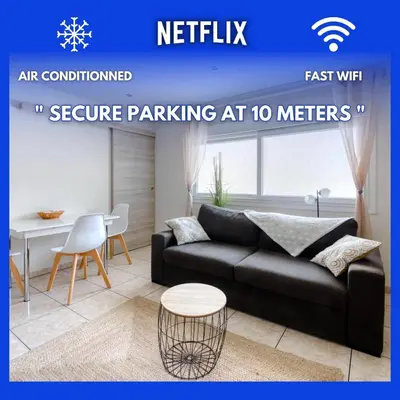 an image of a living room with a couch and a table at Cosy apartment + secured PARKING in Cannes