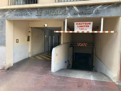 an entrance to a building with a parking garage at Cosy apartment + secured PARKING in Cannes