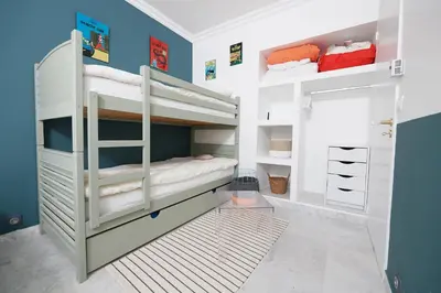 a bunk bed room with two bunk beds at Palm Beach Amazing view in Cannes