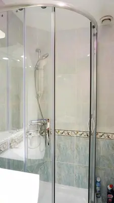 a shower with a glass door in a bathroom at Proche Croisette, Exclusivité Congres by Palmazur in Cannes