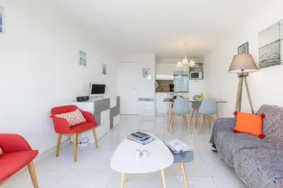 a living room with a couch and a table at Villa Francia in Cannes