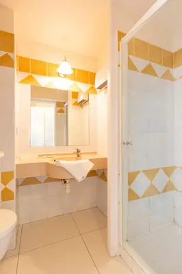 a bathroom with a shower and a sink at Villa Francia in Cannes