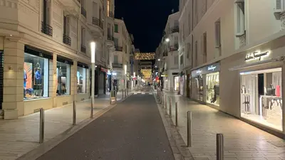 an empty street in a city at night at Village Croisette in Cannes