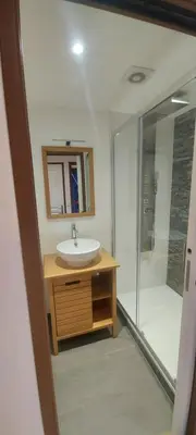 a bathroom with a sink and a shower at le suquet quartier historique in Cannes