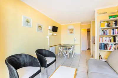 a living room with a couch and chairs and a table at Résidence Cannes Villa Francia - maeva Home - Studio 2 Personnes Confort MAE-1845 in Cannes