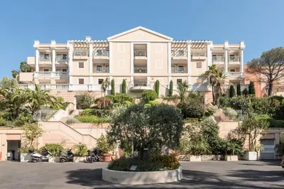 a large building with a tree in front of it at Résidence Cannes Villa Francia - maeva Home - Appartement 3 pièces 4 personnes - Confort MAE-5666 in Cannes