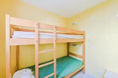 a room with two bunk beds in a room at Résidence Cannes Villa Francia - maeva Home - Appartement 3 pièces 4 personnes - Confort MAE-5666 in Cannes