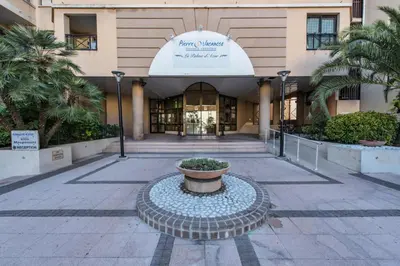 a building with a fountain in front of a building at Résidence Cannes Verrerie - maeva Home - 2 Pièces 5 Personnes Confort MAE-3572 in Cannes