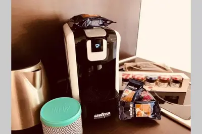a coffee machine sitting on top of a counter at Cannes 78 rue meynadier plage, Mipim Festival 3 minutes à pieds in Cannes