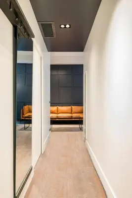 an empty hallway with a bench in a room at RESIDENCE MONTEFIORE in Cannes