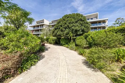 a path in front of a building at LE BOREAL penthouse avec terrasse et vue panoramique spectaculaire sur la ville in Cannes