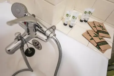 a bathroom with a sink with a faucet and toilets at ++++ renovated cosy 50m2 sunny flat / balcony / close to beach and to the Palais des festivals ++++ in Cannes