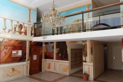 a large room with a chandelier in a building at Palazzio 2, by Welcome to Cannes in Cannes