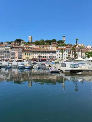 a group of boats docked in a harbor with buildings at 2P 40m2 -Cannes centre- Palais des festivals - in Cannes