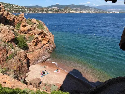a group of people on a beach near the water at 2P 40m2 -Cannes centre- Palais des festivals - in Cannes