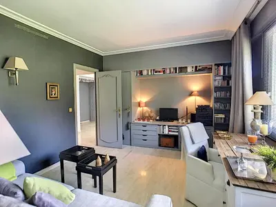 a living room with a couch and a table at FRGK 