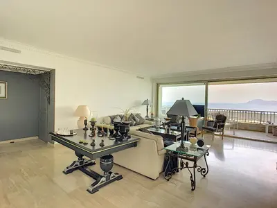 a living room with a couch and a table at FRGK 