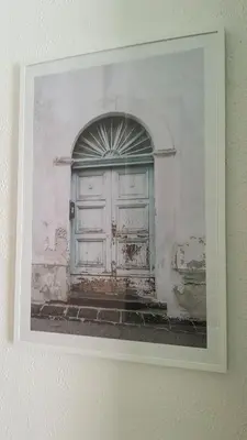 a picture of a blue door on a building at Studio Center Cannes grande Terasse in Cannes