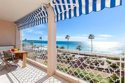 a balcony with a view of the ocean at Résidence Saint Rémy 2 in Cannes