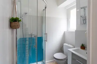 a bathroom with a shower and a toilet and a sink at C11 - 1 BDR Rue Meynadier 5min Palais Festivals & Sea - AC in Cannes