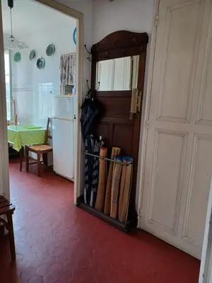 a room with a door with a bunch of baseball bats at Appartement Cannes à quelques pas de la mer, de la Croisette et du Palais des Festivals in Cannes
