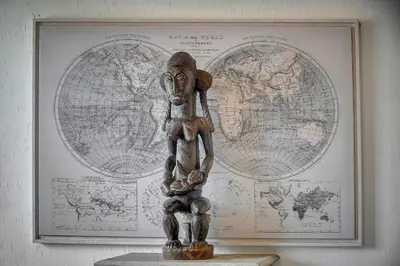 a statue of a person standing in front of a map at IMMOGROOM - Close beaches- Beautiful terrace - Seaview - CONGRESSBEACHES in Cannes