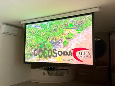 a large flat screen tv with a video game on it at Appartment Jacuzzi in Cannes in Cannes