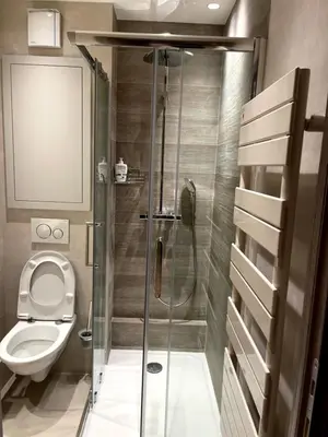 a bathroom with a shower and a toilet at RenTcik in Cannes