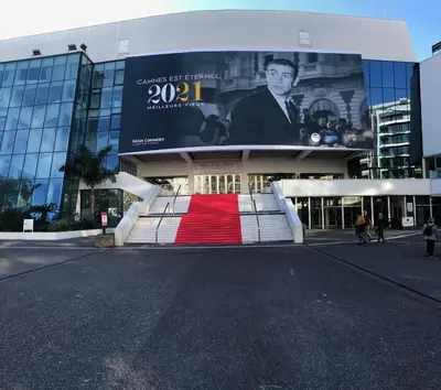 a large building with a red carpet in front of it at Brand new studio in the heart of Cannes in Cannes
